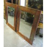 WALL MIRRORS, a pair, rectangular mottled copper, each with a bevelled plate, 91cm W x 123cm H.