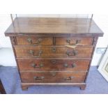 BACHELOR'S CHEST, George II oak, of diminutive proportions with flip over top above four drawers,