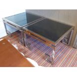 LAMP TABLES, a pair, 1970's with smoked glass tops and polished metal frames, 55cm x 55cm x 39cm H.