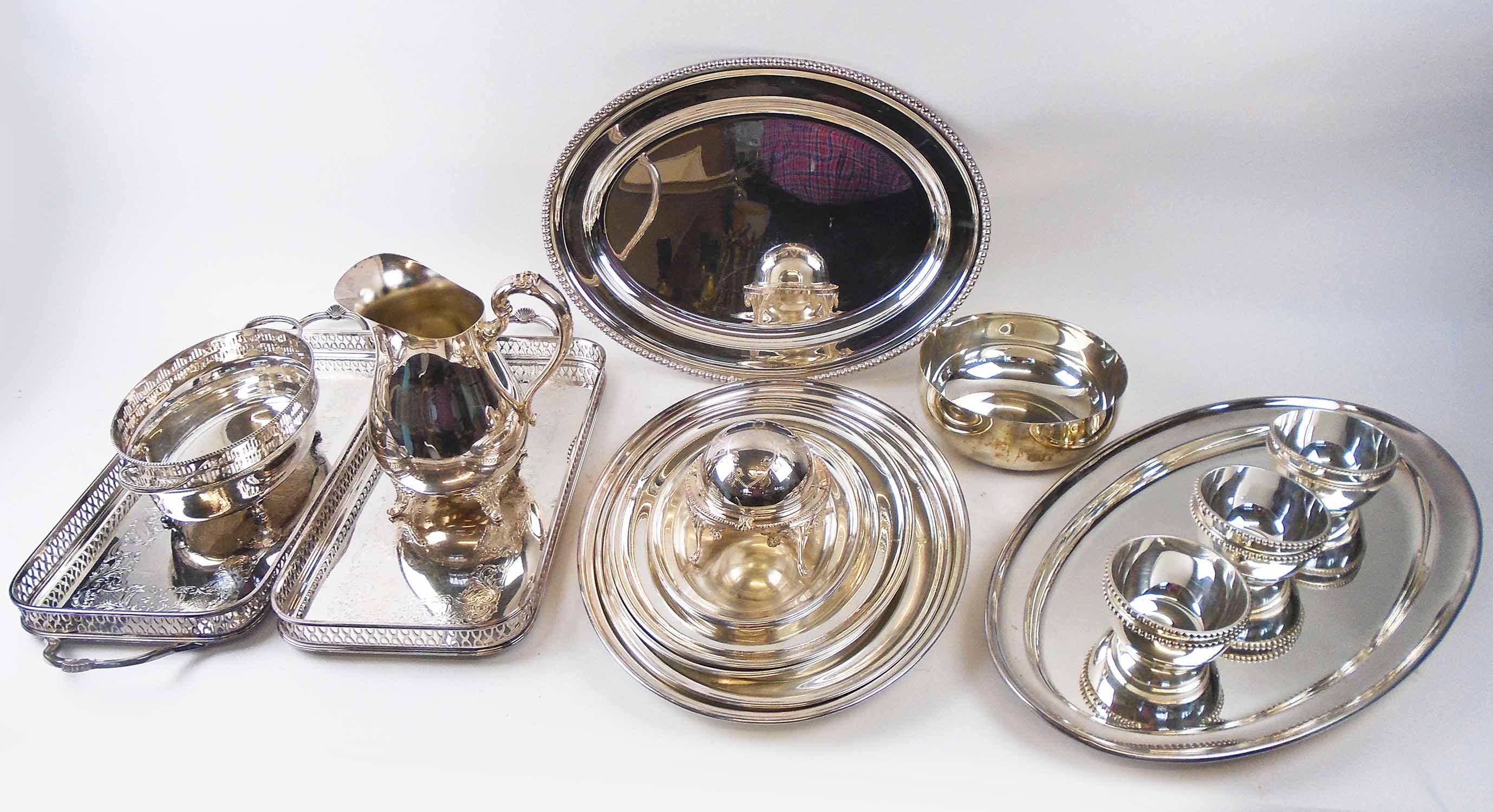 SILVER PLATED SERVING WARES, including graduating size platters, bowls, trays, jug etc.