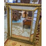 WALL MIRROR, 19th century giltwood and gesso moulded,