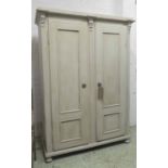 ARMOIRE, 19th century French, traditionally grey painted with two panelled doors enclosing hanging,