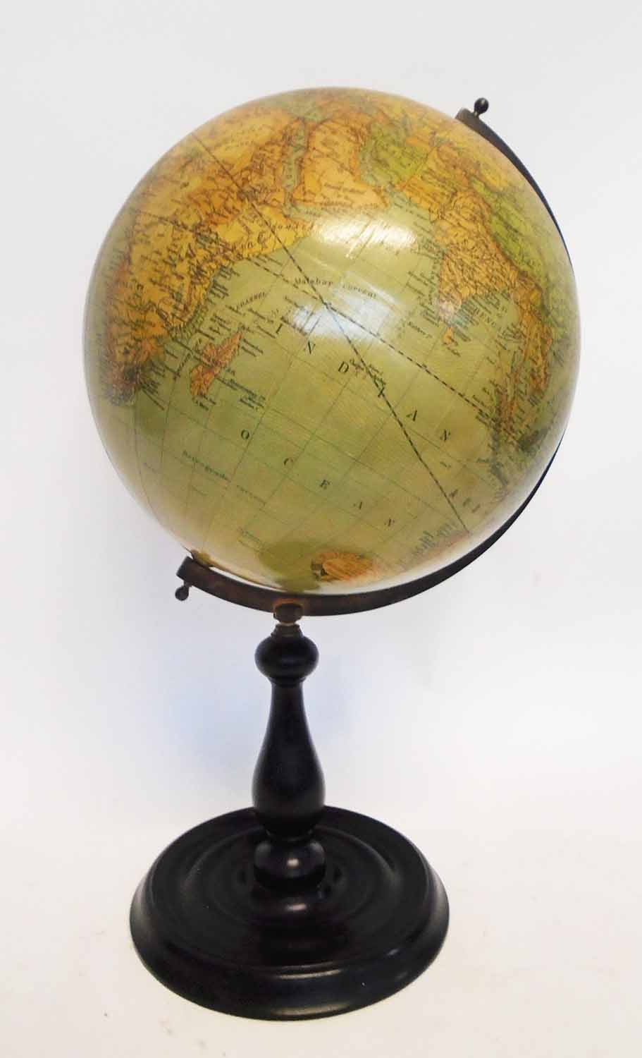 TABLE TOP TERRESTRIAL GLOBE, turned wooden supports, 53cm H overall.