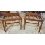 LUGGAGE STANDS, a pair, early 20th century mahogany, each with raised back and brass mounted slats,