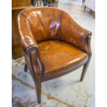 DESK CHAIR, early 20th century George III design mahogany with antique tan brown leather upholstery.