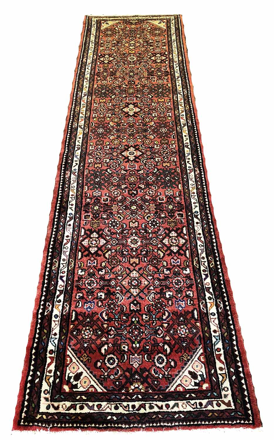 HAMADAN RUNNER, 312cm x 80cm, herati all over design within corresponding borders.