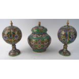 CLOISONNÉ LIDDED VASES, a pair, 24cm H, plus a similar lidded jar, 25cm H.