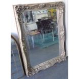 CONTEMPORARY WALL MIRROR, continental style, silver gilt frame, bevelled plate, 80cm W x 11cm H.