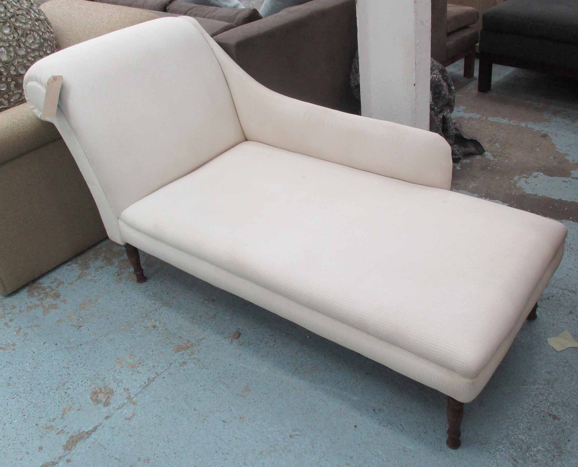 CHAISE LONGUE, in cream fabric on turned wooden supports, 152cm L.