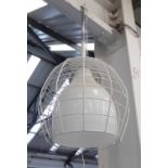 DESIEL WITH FOSCARINI CAGE PENDANT LIGHT, the opaque glass shade in a caged outer shade,