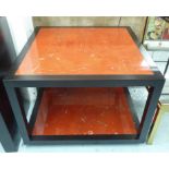 POST MODERN INSPIRED SIDE TABLE, the ebonised frame with red marblesque top and undertier,