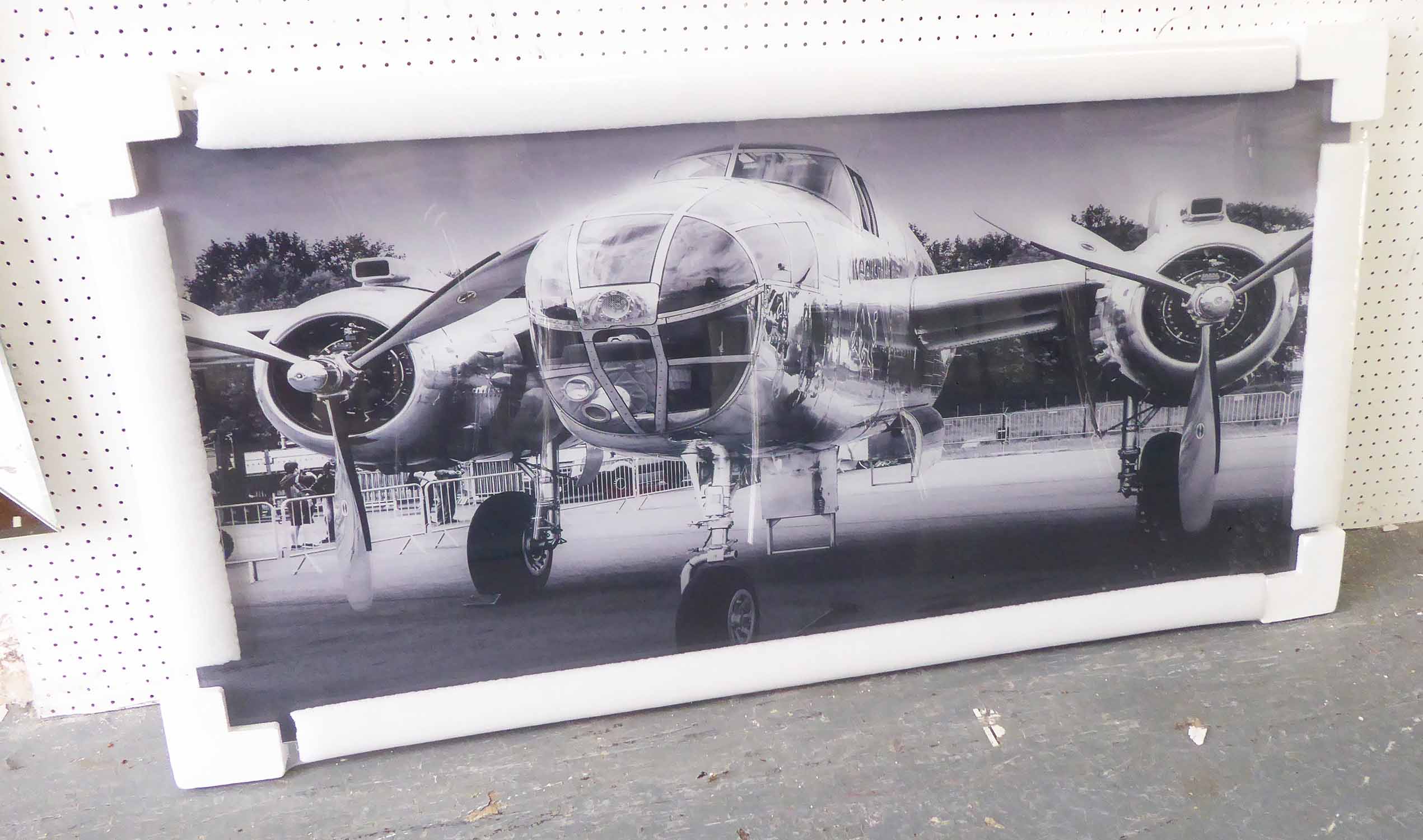 21ST CENTURY PHOTOGRAPH OF AN AMERICAN BOMBER, on tempered glass, 60cm x 120cm.