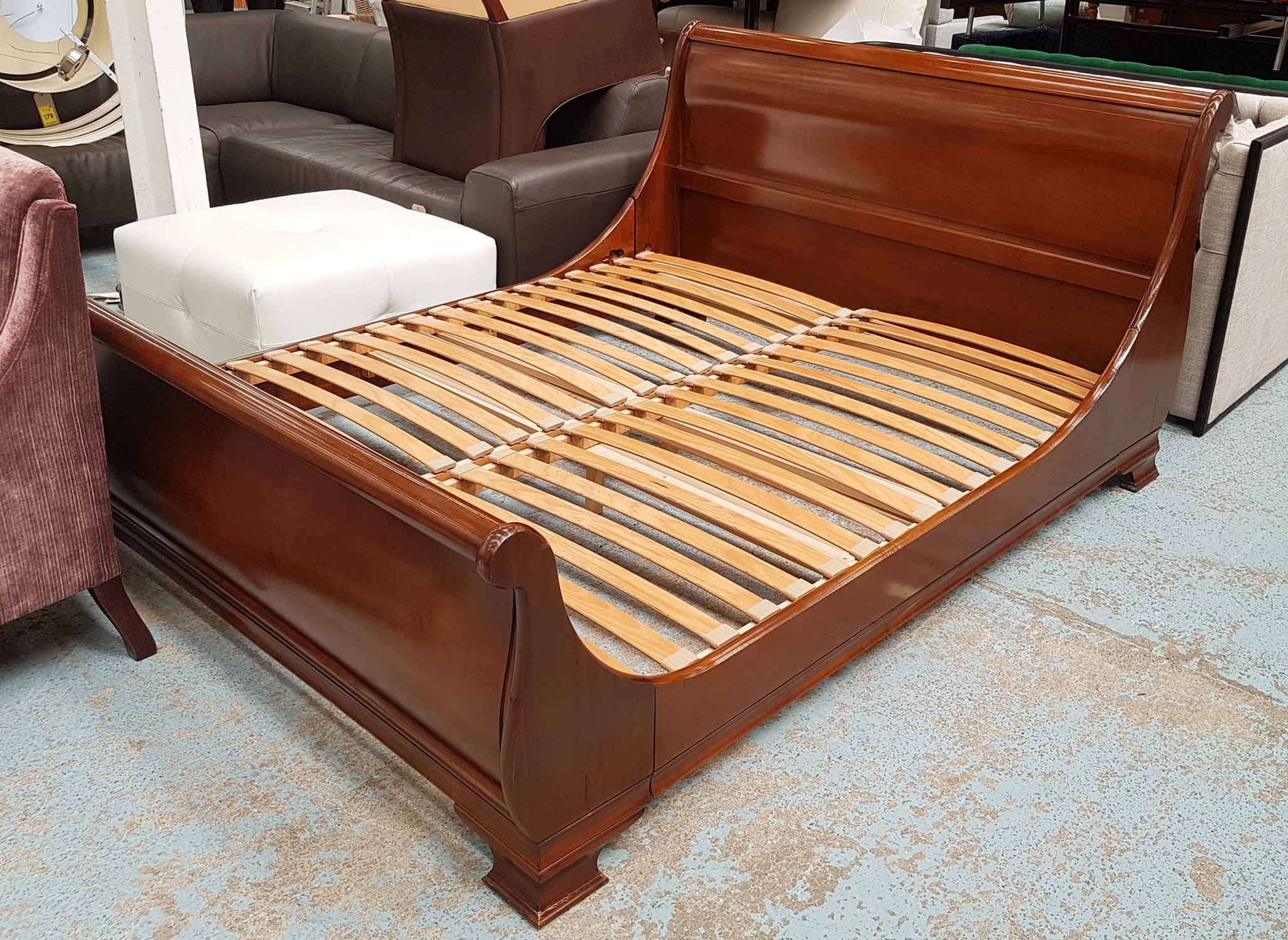 SLEIGH BED, 5ft 6in in mahogany with base (no mattress).