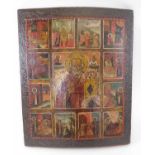 19TH CENTURY RUSSIAN ICON, depicting St Nicholas, with a surround of twelve allegorical vignettes,