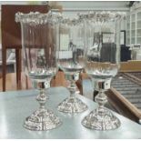 TABLE CANDLE LANTERNS, set three, tulip glass tops silvered metal bases.