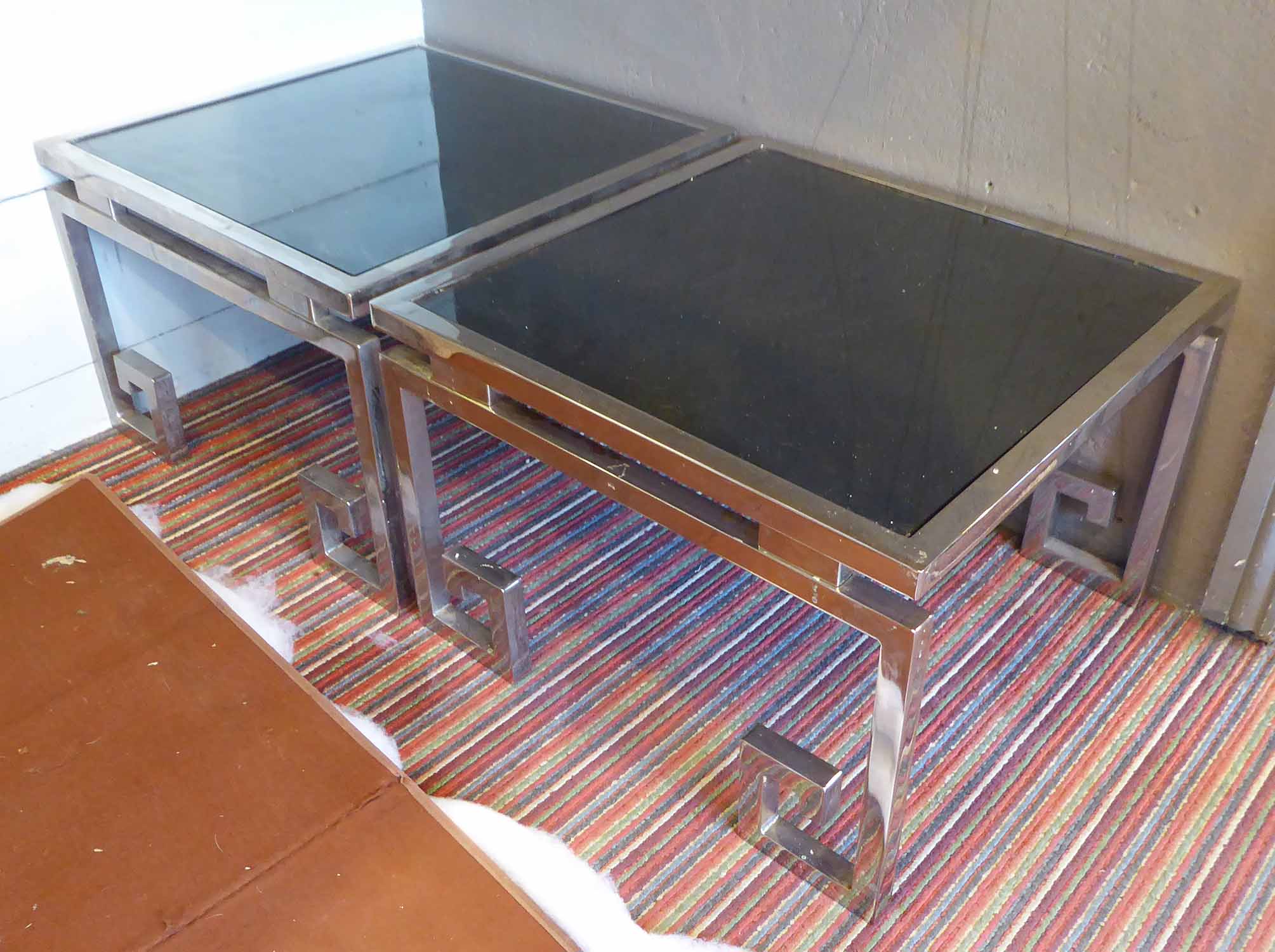1970'S LAMP TABLES, a pair, with smoked glass tops and polished metal frames, 55cm x 55cm x 39cm H.