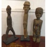 TRIBAL ARTS, Lobi altar post, 56cm H on stand; and two other Lobi figural carvings, 51cm and 52cm.