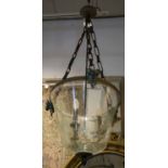 HANGING LIGHT, bronze, brass and iron with glass shade,