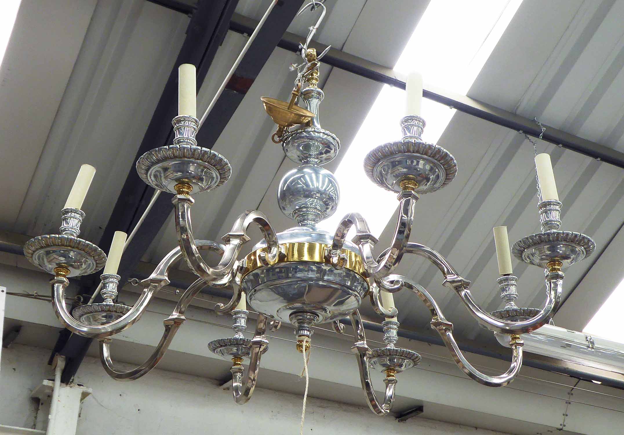 CONTEMPORARY CHANDELIER, in a Dutch inspired style, polished metal, eight branch, 102cm L.