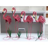 FLAMINGOS, a set of four, in painted metal, 75cm H.