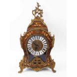 LOUIS XV STYLE MANTEL CLOCK, the case detailed with fruiting vines and gilt metal mounts,