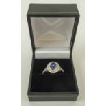 18K WHITE GOLD TANZANITE AND DIAMOND CLUSTER RING, 1.2cts size L.