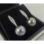 PAIR OF WHITE GOLD SOUTH SEA PEARL AND DIAMOND DROP EARRINGS.