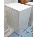 ABBINABILI BEDSIDE CABINET, in white lacquered finish, with drawer and cupboard below,