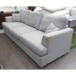 CONTEMPORARY SOFA, three seater, in a grey fabric on chromed metal supports, 251cm L.