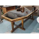 VINTAGE DINING TABLE, with black glass top, black brass surround, on brass base,