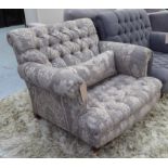 ARMCHAIR, contemporary, in a patterned fabric, with a buttoned seat, 104cm W.