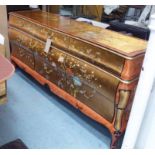 SIDEBOARD, bombe design, orange lacquer and gilt finish,