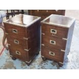 CAMPAIGN BEDSIDE CHESTS, a pair,