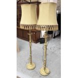 PAIR OF STANDARD LAMPS, green painted with gilt detail plus shades, each 175cm H.