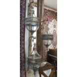 GARDEN HANGING LANTERNS, a set of three, each with a bracket, a handle to the top and glazed panels,