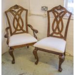 DINING CHAIRS, a set of twelve, mahogany with entwined pierced splats, stuff-over seats,