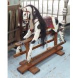 ROCKING HORSE, early 20th century painted on pine and ash supports, 95cm H x 110cm L.