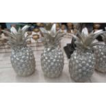 DECORATIVE PINEAPPLES, set of four, silvered finish, 25cm H.