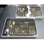 CUTLERY SETS, a boxed pair, 24 pieces in total, 44cm x 28cm (box).