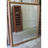 WALL MIRROR, gilt with a rectangular plate, 135cm W x 165.5cm H.