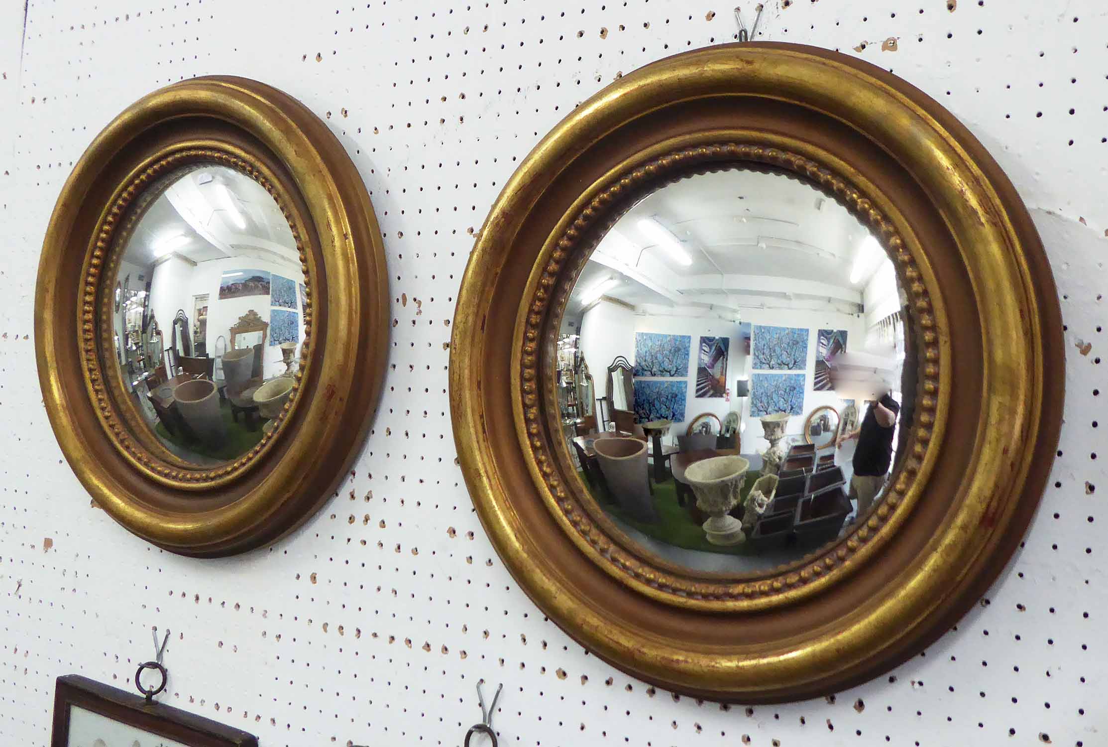 BUTLER'S MIRRORS, a pair, gilt finish, 45cm diam.