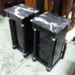 BEDSIDE CABINETS, a pair, Empire style, ebonised with marble top, above a drawer and door,