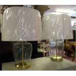 LAMPS, a pair, glass vase shaped with brass trim and shades.