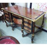 BUREAU MAZARIN, boulle style of large proportions with seven drawers and recessed door,