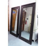 MIRRORS, a pair, contemporary style, in black painted finish, 187cm x 84cm.