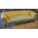 CHESTERFIELD SOFA, Victorian walnut in yellow and green fabric on turned supports,