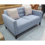SOFA, contemporary of slight proportions with cushions, 135cm x 85cm x 75cm H.