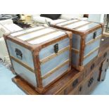 AVIATOR STYLE TRUNKS, a pair, aluminium with leather banding, 41cm x 41cm x 41cm.