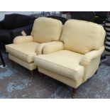 HOWARD STYLE ARMCHAIRS, a pair, in a mellow yellow fabric, 75cm W.