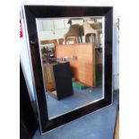 MIRROR, Bauhaus inspired design, polished metal frame with black detail, 146cm x 115cm.